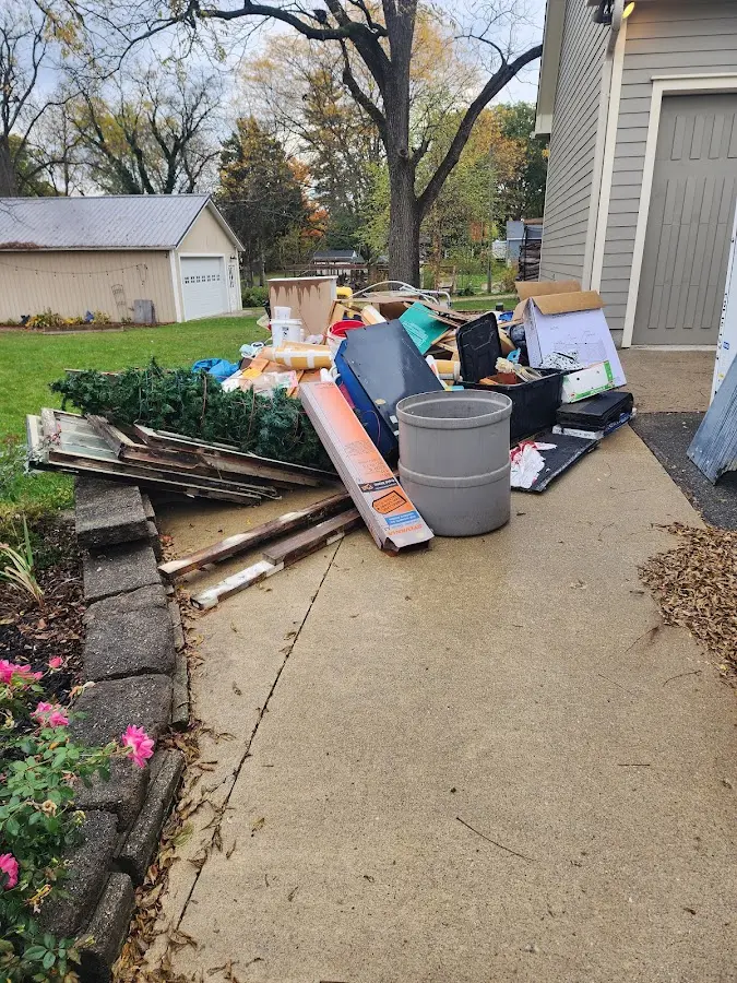 Dumpster being loaded with debris for Residential Dumpster Rental in Isla Vista